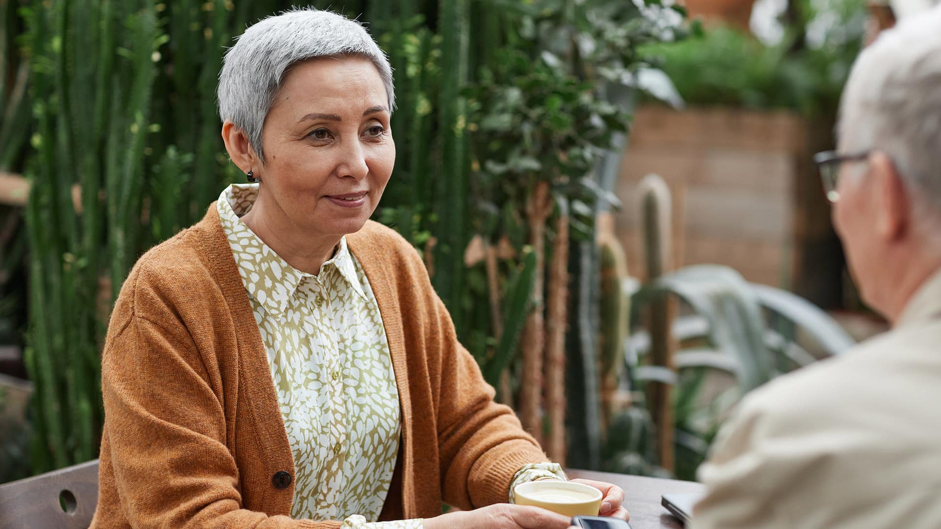 Are Pre-paid Funeral Plans Worth It Cover Image. Woman at table